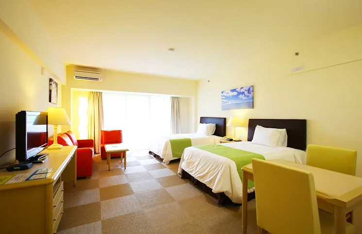 Premier Room - Twin beds with luxurious headboard